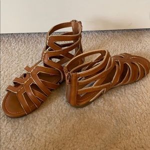 kids sandals with zipper up the back lightly worn.